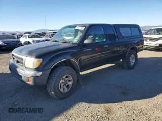 2000 Toyota Tacoma с VIN 4TAWM72NXYZ652630, выставлен на аукционе Copart как лот 87301135 с пробегом 197 826 миль миль и Чистый • Clean title. История ставок и продаж доступна на DreamBid. Изображение 1.