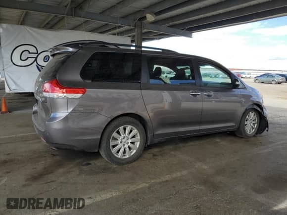 2014 Toyota Sienna Limited with VIN 5TDDK3DC9ES075981, listed as a Copart auction lot 84604665 with 97,797 mi miles and Salvage title. Bid and sale history available at DreamBid. Image 3.