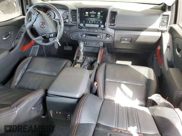 2023 Nissan Frontier Pro-X with VIN 1N6ED1EJ6PN670843, listed as a Copart auction lot 51841865 with 8,825 mi miles and Salvage title. Bid and sale history available at DreamBid. Image 8.