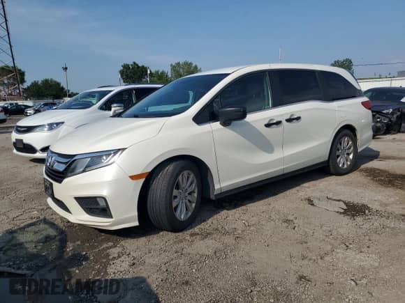 2019 Honda Odyssey LX with VIN 5FNRL6H28KB073922, listed as a Copart auction lot 64742855 with 167,838 mi miles and Salvage title. Bid and sale history available at DreamBid. Image 1.