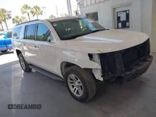 2015 Chevrolet Suburban LT with VIN 1GNSCJKC3FR568896, listed as a IAAI auction lot 42145520 with 194,196 mi miles and . Bid and sale history available at DreamBid. Image 1.