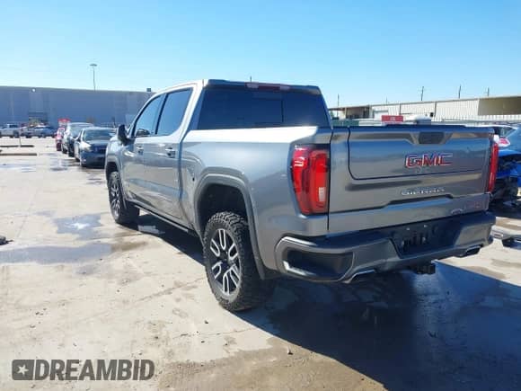 2022 GMC Sierra 1500 AT4 with VIN 1GTP9EEL0NZ199090, listed as a IAAI auction lot 41380413 with 100,657 mi miles and . Bid and sale history available at DreamBid. Image 3.