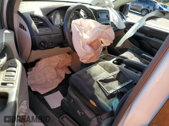 2014 Dodge Grand Caravan SXT z VIN 2C4RDGCG8ER289252, wystawiony jako Copart lot #80755915 z przebiegiem Nie podano mil oraz Szkoda całkowita • Salvage title. Historia ofert i sprzedaży dostępna na DreamBid. Obrazek 8.