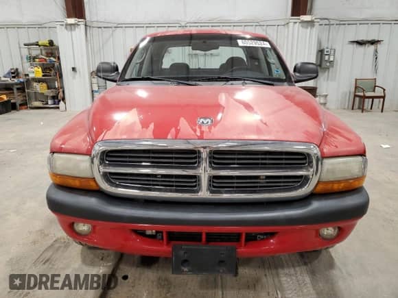 2004 Dodge Dakota Sport z VIN 1D7HL38NX4S509668, wystawiony jako Copart lot #80529524 z przebiegiem 74 349 mil mil oraz Czysty tytuł • Clean title. Historia ofert i sprzedaży dostępna na DreamBid. Obrazek 5.