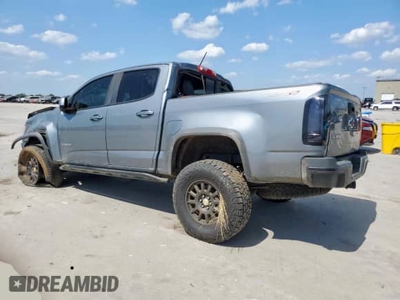 2018 Chevrolet Colorado 4WD ZR2 with VIN 1GCPTEE11J1243686, listed as a Copart auction lot 58235125 with 144,760 mi miles and Salvage title. Bid and sale history available at DreamBid. Image 2.