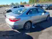 2016 Toyota Camry XLE z VIN 4T1BD1FK0GU199867, wystawiony jako IAAI lot #43473931 z przebiegiem 148 028 mil mil oraz . Historia ofert i sprzedaży dostępna na DreamBid. Obrazek 4.