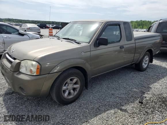 2001 Nissan Frontier XE with VIN 1N6DD26S21C397671, listed as a Copart auction lot 54108355 with 174,195 mi miles and Salvage title. Bid and sale history available at DreamBid. Image 1.
