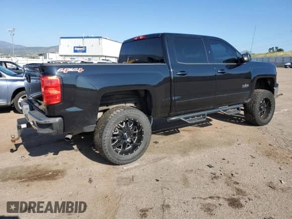 2015 Chevrolet Silverado 1500 LT with VIN 3GCUKREC8FG253087, listed as a Copart auction lot 63561595 with 142,252 mi miles and Salvage title. Bid and sale history available at DreamBid. Image 3.