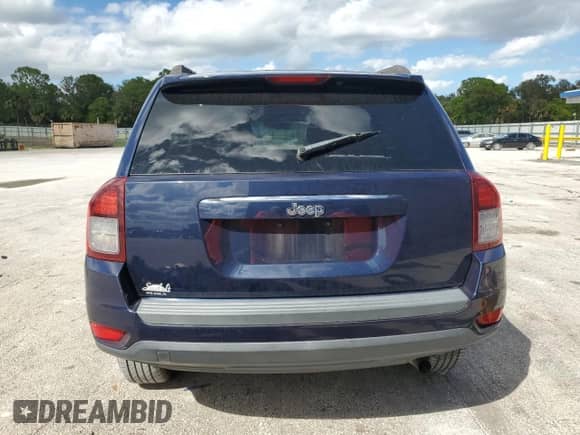 2014 Jeep Compass Sport z VIN 1C4NJCBB3ED679460, wystawiony jako Copart lot #87197415 z przebiegiem 117 309 mil mil oraz Szkoda całkowita • Salvage title. Historia ofert i sprzedaży dostępna na DreamBid. Obrazek 6.