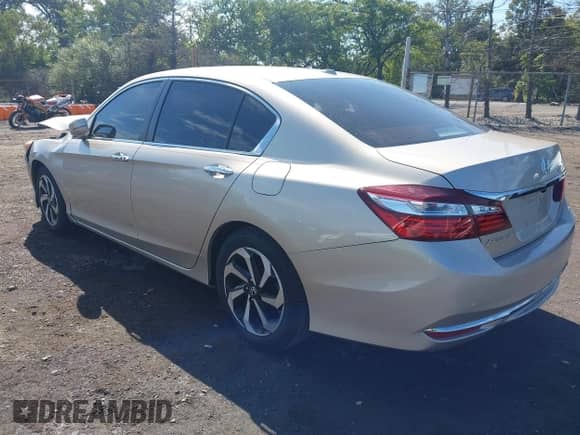2016 Honda Accord EX-L with VIN 1HGCR2F80GA001876, listed as a IAAI auction lot 43318852 with 141,547 mi miles and . Bid and sale history available at DreamBid. Image 3.