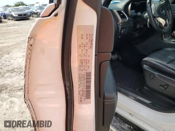 2017 Jeep Grand Cherokee Overland with VIN 1C4RJECG4HC740042, listed as a Copart auction lot 83797275 with 67,534 mi miles and Salvage title. Bid and sale history available at DreamBid. Image 13.