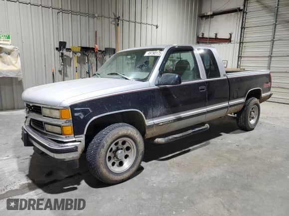 1995 Chevrolet Silverado 2500 с VIN 2GCFK29K6S1239533, выставлен на аукционе Copart как лот 49790175 с пробегом 55 840 миль миль и Списание • Salvage title. История ставок и продаж доступна на DreamBid. Изображение 1.