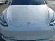 2023 Tesla Model Y Long Range with VIN 7SAYGDEE0PA135579, listed as a IAAI auction lot 43196811 with 44,886 mi miles and . Bid and sale history available at DreamBid. Image 10.