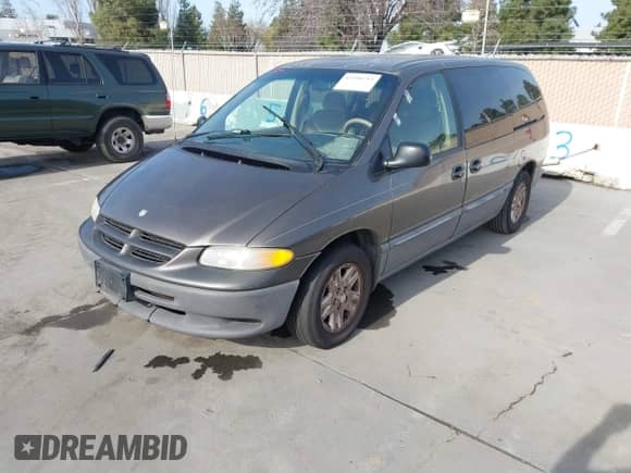 1997 Dodge Caravan LE with VIN 1B4GP54L0VB413556, listed as a IAAI auction lot 41590793 with 249,724 mi miles and . Bid and sale history available at DreamBid. Image 2.