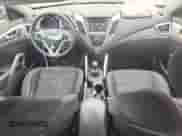 2013 Hyundai Veloster w/Black Int с VIN KMHTC6AD5DU173242, выставлен на аукционе Copart как лот 64368995 с пробегом 157 766 миль миль и Чистый • Clean title. История ставок и продаж доступна на DreamBid. Изображение 8.