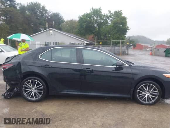 2023 Toyota Camry Hybrid XLE with VIN 4T1F31AK7PU602464, listed as a IAAI auction lot 43392293 with 41,716 mi miles and . Bid and sale history available at DreamBid. Image 13.