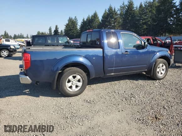 2011 Nissan Frontier Pro-4X with VIN 1N6AD0CW9BC434232, listed as a Copart auction lot 85366185 with 114,736 mi miles and Salvage title. Bid and sale history available at DreamBid. Image 3.