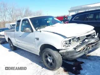 2003 Ford F-150 XL with VIN 2FTRX17W13CA94356, listed as a IAAI auction lot 41346444 with 180,686 mi miles and . Bid and sale history available at DreamBid. Image 1.