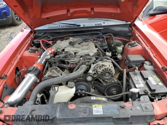 2001 Ford Mustang Deluxe z VIN 1FAFP444X1F157095, wystawiony jako Copart lot #86266745 z przebiegiem 93 557 mil mil oraz Czysty tytuł • Clean title. Historia ofert i sprzedaży dostępna na DreamBid. Obrazek 11.