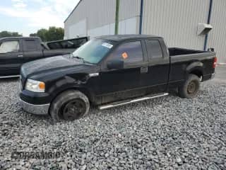 2005 Ford F-150 XLT with VIN 1FTPX14595FB56919, listed as a Copart auction lot 81118505 with 140,872 mi miles and Salvage title. Bid and sale history available at DreamBid. Image 1.