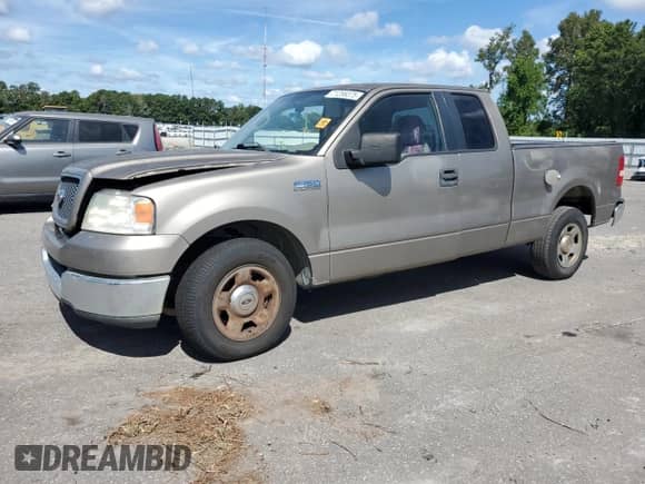 2005 Ford F-150 STX with VIN 1FTRX12W25FA37128, listed as a Copart auction lot 71256075 with 231,578 mi miles and Salvage title. Bid and sale history available at DreamBid. Image 1.