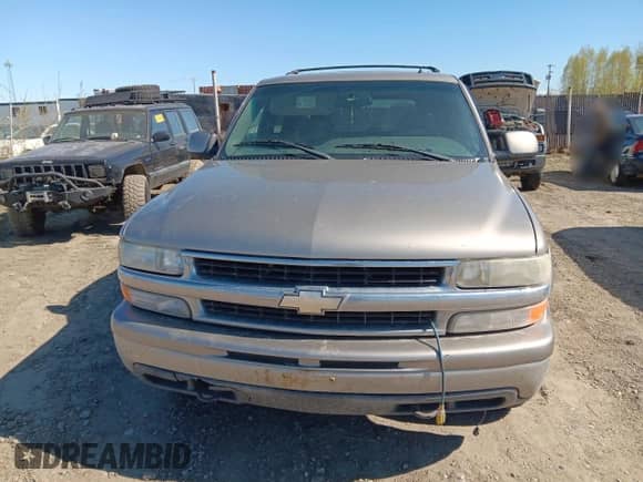 2002 Chevrolet Suburban Z71 z VIN 3GNFK16Z52G238089, wystawiony jako Copart lot #57183975 z przebiegiem Nie podano mil oraz Szkoda całkowita • Salvage title. Historia ofert i sprzedaży dostępna na DreamBid. Obrazek 5.