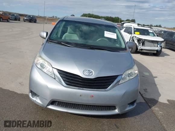 2014 Toyota Sienna LE with VIN 5TDKK3DC0ES509583, listed as a IAAI auction lot 43424567 with 217,639 mi miles and . Bid and sale history available at DreamBid. Image 12.