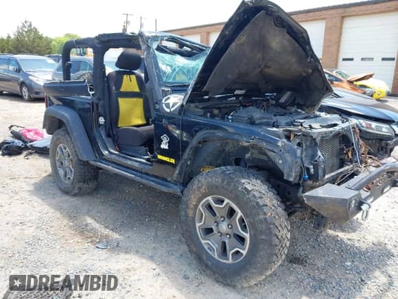 2013 Jeep Wrangler Rubicon 10th Anniversary with VIN 1C4BJWCG0DL573065, listed as a IAAI auction lot 42299018 with Not provided miles and . Bid and sale history available at DreamBid. Image 1.