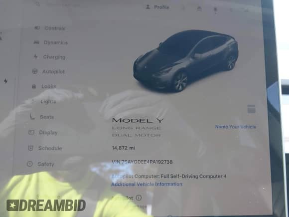 2023 Tesla Model Y Long Range with VIN 7SAYGDEE4PA192738, listed as a IAAI auction lot 43364402 with 14,872 mi miles and . Bid and sale history available at DreamBid. Image 15.