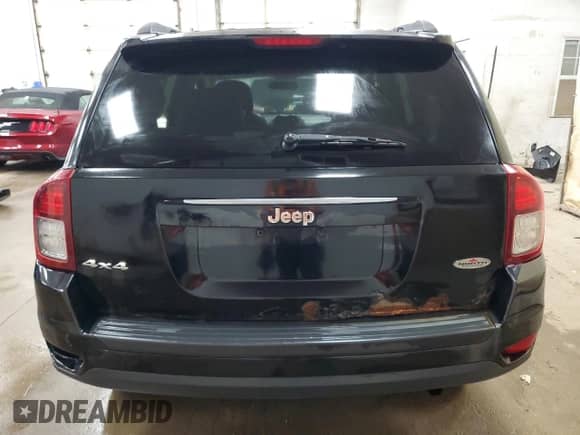 2014 Jeep Compass Sport z VIN 1C4NJDAB6ED728271, wystawiony jako Copart lot #70187355 z przebiegiem 224 993 mil mil oraz Czysty tytuł • Clean title. Historia ofert i sprzedaży dostępna na DreamBid. Obrazek 6.