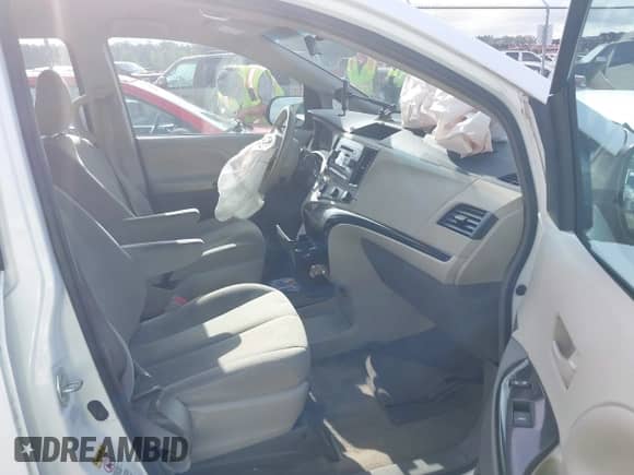 2012 Toyota Sienna with VIN 5TDZK3DC8CS180806, listed as a IAAI auction lot 42401264 with 201,007 mi miles and . Bid and sale history available at DreamBid. Image 5.