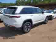 2024 Jeep Grand Cherokee with VIN 1C4RJYB60RC129744, listed as a IAAI auction lot 43065938 with 33,111 mi miles and . Bid and sale history available at DreamBid. Image 4.