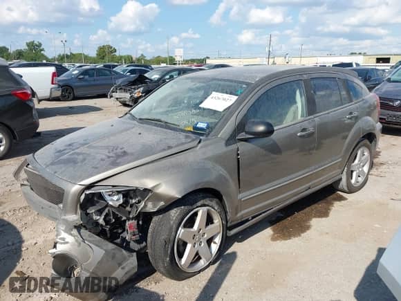 2007 Dodge Caliber R/T with VIN 1B3HB78K97D150415, listed as a IAAI auction lot 43267027 with 210,429 mi miles and . Bid and sale history available at DreamBid. Image 17.