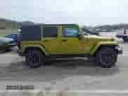 2007 Jeep Wrangler Unlimited Sahara z VIN 1J8GA59167L161894, wystawiony jako IAAI lot #41856064 z przebiegiem 122 714 mil mil oraz . Historia ofert i sprzedaży dostępna na DreamBid. Obrazek 14.
