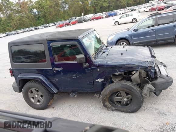 2013 Jeep Wrangler Sport with VIN 1C4AJWAG7DL565091, listed as a IAAI auction lot 43267062 with 192,629 mi miles and . Bid and sale history available at DreamBid. Image 13.