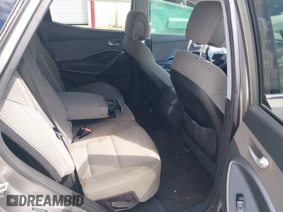 2018 Hyundai Santa Fe 2.4L with VIN 5NMZT3LB0JH053313, listed as a IAAI auction lot 42992926 with 140,803 mi miles and . Bid and sale history available at DreamBid. Image 8.