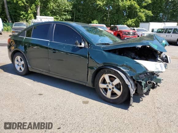 2014 Chevrolet Cruze 1LT z VIN 1G1PC5SB9E7157017, wystawiony jako Copart lot #71063605 z przebiegiem 143 565 mil mil oraz Szkoda całkowita • Salvage title. Historia ofert i sprzedaży dostępna na DreamBid. Obrazek 4.