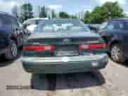 1999 Toyota Camry LE z VIN 4T1BG22K7XU443923, wystawiony jako Copart lot #61206005 z przebiegiem 265 239 mil mil oraz Czysty tytuł • Clean title. Historia ofert i sprzedaży dostępna na DreamBid. Obrazek 6.