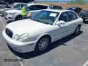 2004 Hyundai Sonata GLS z VIN KMHWF35H74A062189, wystawiony jako IAAI lot #42889270 z przebiegiem 241 183 mil mil oraz . Historia ofert i sprzedaży dostępna na DreamBid. Obrazek 2.