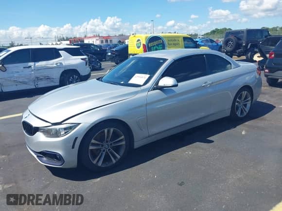 2018 BMW 4 Series 430i with VIN WBA4Z1C50JEC70595, listed as a IAAI auction lot 42994824 with 102,064 mi miles and . Bid and sale history available at DreamBid. Image 2.
