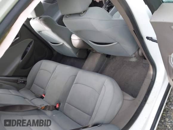 2018 Chevrolet Malibu LS z VIN 1G1ZB5ST7JF277595, wystawiony jako IAAI lot #43289380 z przebiegiem 62 729 mil mil oraz . Historia ofert i sprzedaży dostępna na DreamBid. Obrazek 8.