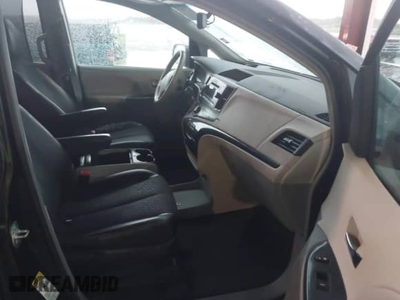 2014 Toyota Sienna SE with VIN 5TDXK3DC5ES456630, listed as a IAAI auction lot 42370657 with 164,633 mi miles and . Bid and sale history available at DreamBid. Image 5.