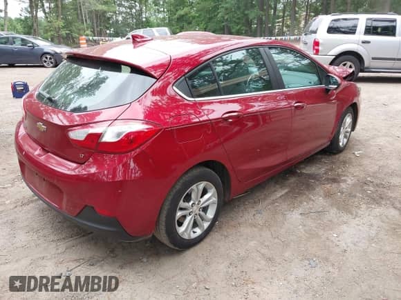 2019 Chevrolet Cruze LT с VIN 3G1BE6SM5KS567080, выставлен на аукционе IAAI как лот 42916378 с пробегом 96 030 миль миль и . История ставок и продаж доступна на DreamBid. Изображение 4.