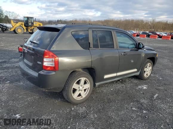 2010 Jeep Compass Latitude с VIN 1J4NF1FB0AD675869, выставлен на аукционе Copart как лот 83742284 с пробегом 167 564 миль миль и Списание • Salvage title. История ставок и продаж доступна на DreamBid. Изображение 3.