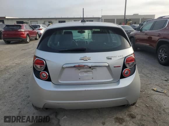 2015 Chevrolet Sonic LTZ with VIN 1G1JE6SB4F4208996, listed as a Copart auction lot 65555385 with 76,714 mi miles and Salvage title. Bid and sale history available at DreamBid. Image 6.