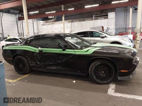 2013 Dodge Challenger SXT с VIN 2C3CDYAG7DH704245, выставлен на аукционе IAAI как лот 43250299 с пробегом Не указан миль и . История ставок и продаж доступна на DreamBid. Изображение 12.