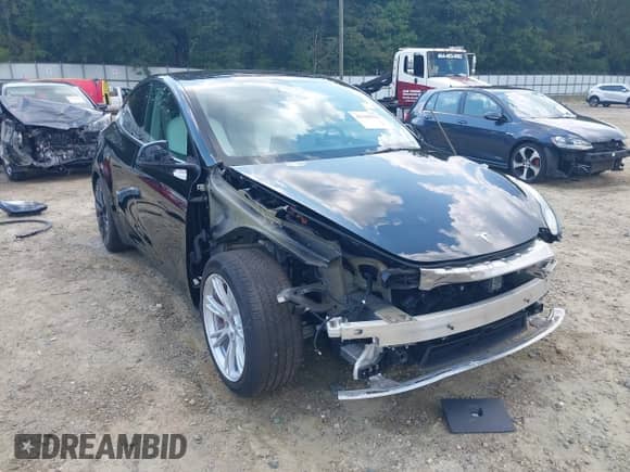 2021 Tesla Model Y Performance with VIN 5YJYGDEF1MF121694, listed as a IAAI auction lot 43168322 with 39,243 mi miles and . Bid and sale history available at DreamBid. Image 6.