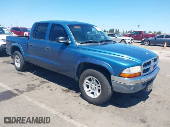 2003 Dodge Dakota SLT с VIN 1D7HL48N83S247654, выставлен на аукционе IAAI как лот 42337656 с пробегом 169 001 миль миль и . История ставок и продаж доступна на DreamBid. Изображение 1.