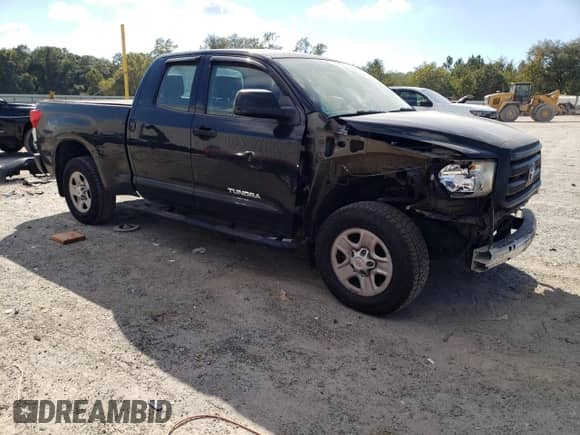 2012 Toyota Tundra с VIN 5TFRU5F17CX026275, выставлен на аукционе Copart как лот 86421535 с пробегом 157 606 миль миль и Списание • Salvage title. История ставок и продаж доступна на DreamBid. Изображение 4.