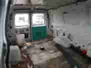 2002 Ford Econoline Cargo с VIN 1FTNE24L82HB20009, выставлен на аукционе Copart как лот 88262735 с пробегом 150 607 миль миль и Чистый • Clean title. История ставок и продаж доступна на DreamBid. Изображение 11.